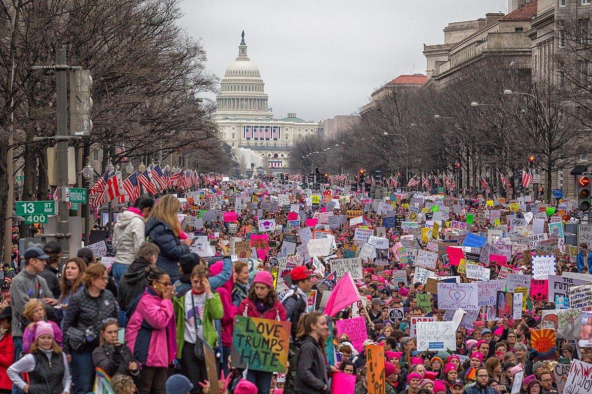 2017 Women's March - Wikipedia | thousands flood the streets of Washington DC, many in bright pink, for the 2017 Women’s March on Washington