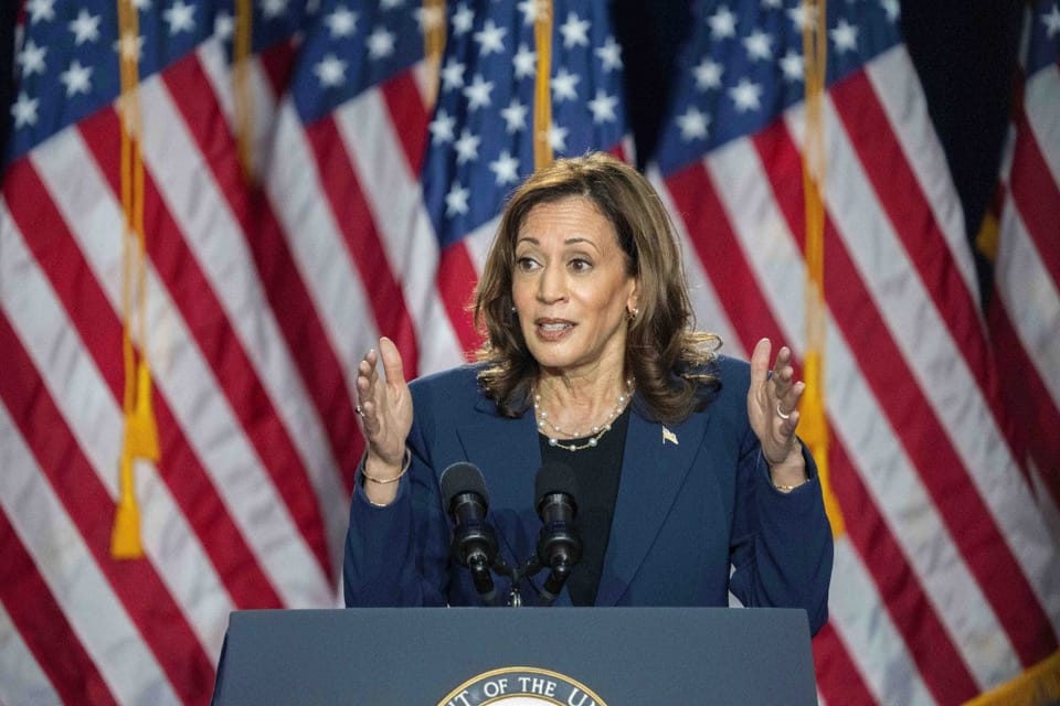 Kamala Harris standing in front of a Wisconsin audience.